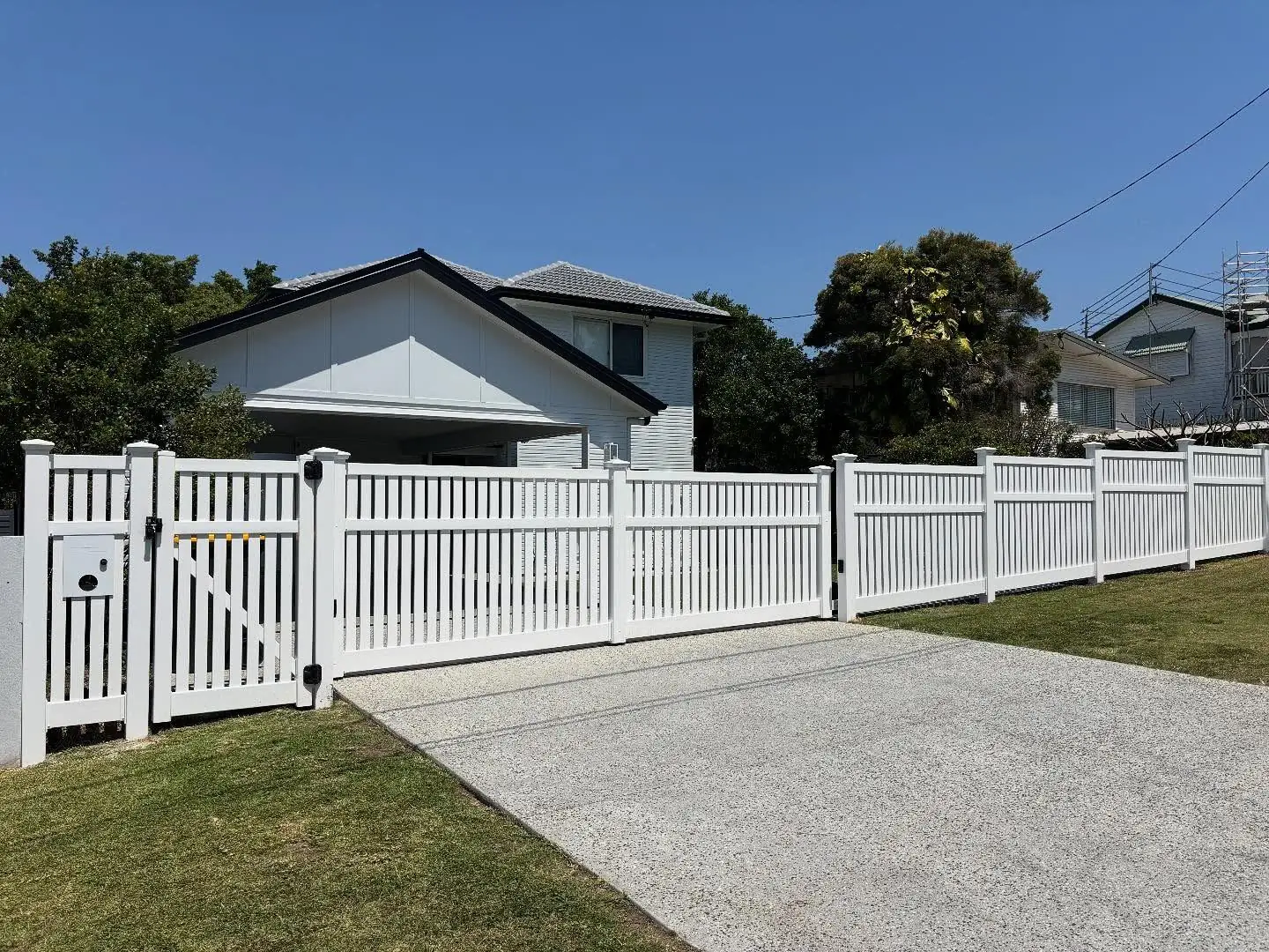 Front-yard PVC fence with feature posts
