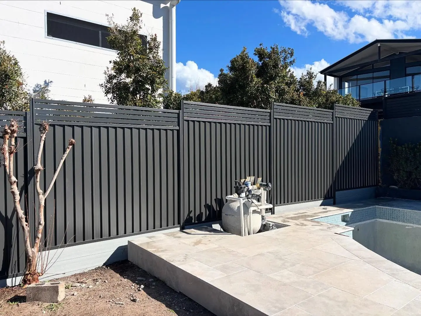 Charcoal Colorbond pool surround with slat top