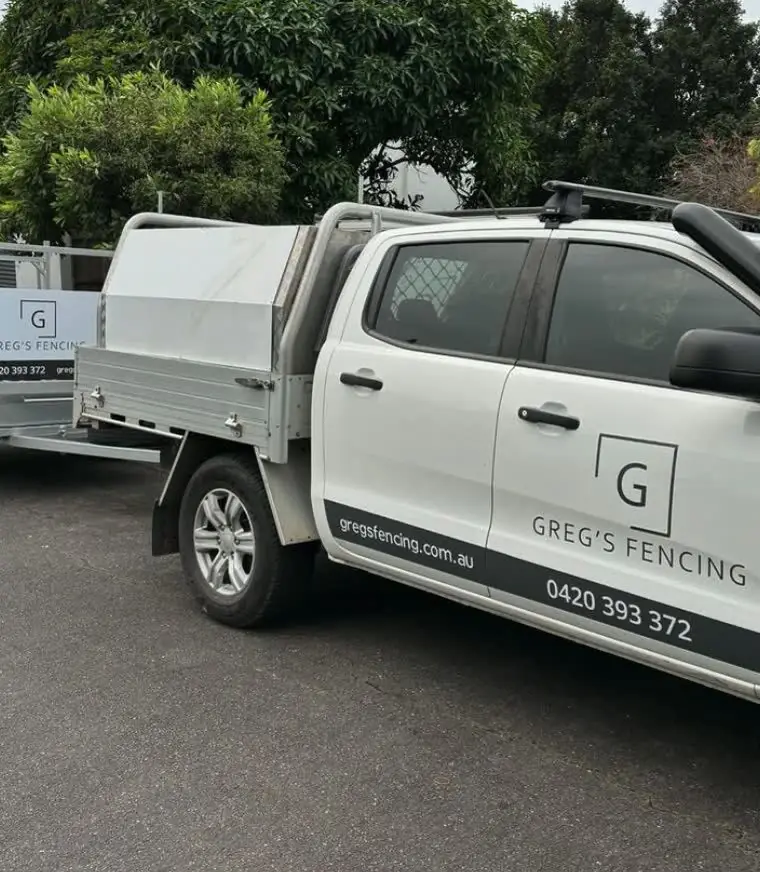 Greg installing a timber fence in the Redlands